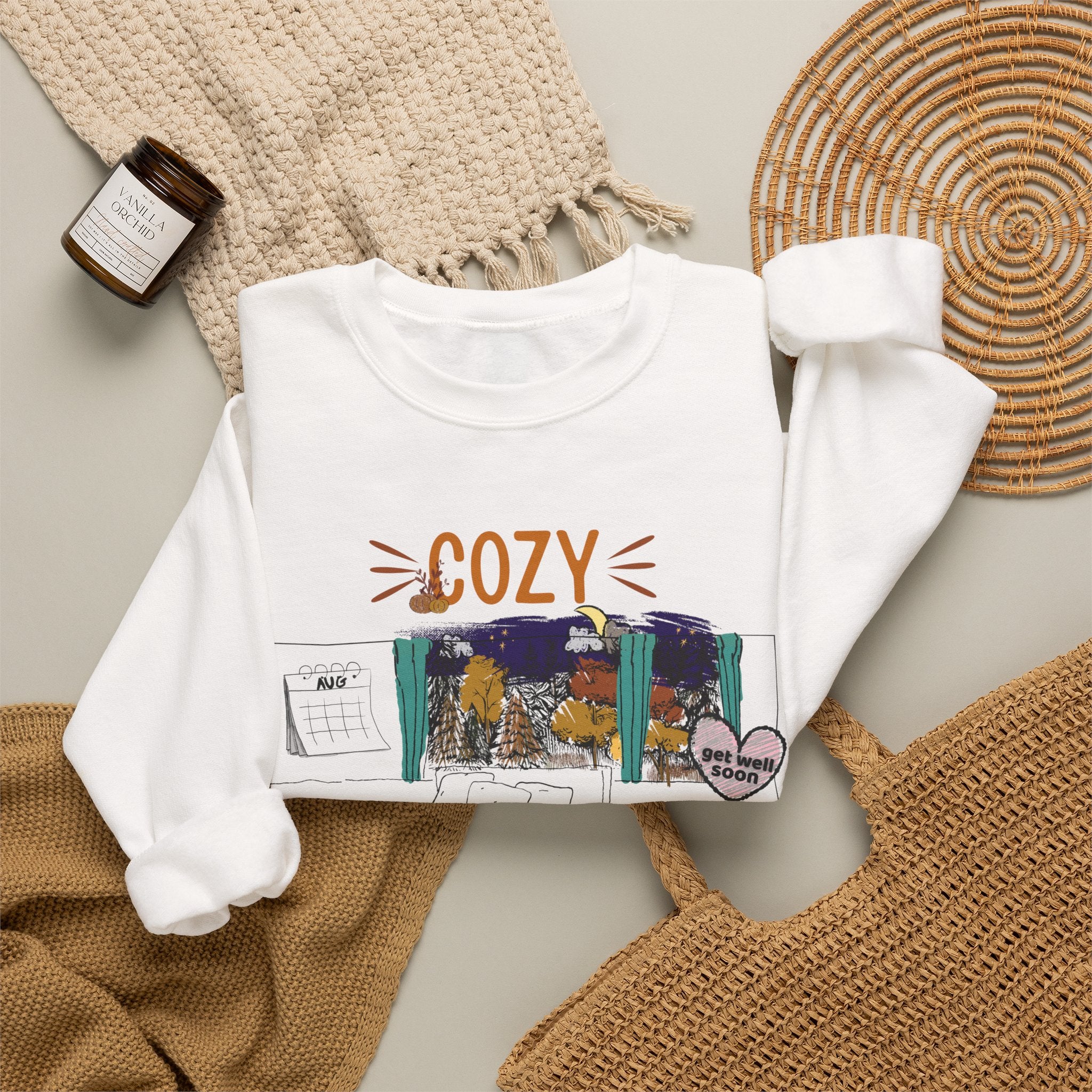 Cozy Within Reason fall crewneck by HKitty Enterprises, a funny autumn bedroom scene with a sleeping cat, a nighttime fall window, and a dying plant getting a get well soon balloon