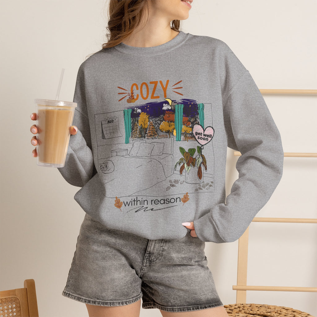 Cozy Within Reason fall crewneck by HKitty Enterprises, a funny autumn bedroom scene with a sleeping cat, a nighttime fall window, and a dying plant getting a get well soon balloon